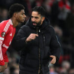 MANCHESTER, ENGLAND - NOVEMBER 28: Ruben Amorim, Head Coach of Manchester United, speaks to Marcus Rashford of Manchester United as he prepares to enter the pitch as a substitute during the UEFA Europa League 2024/25 League Phase MD5 match between Manchester United and FK Bodo/Glimt at Old Trafford on November 28, 2024 in Manchester, England. (Photo by Justin Setterfield/Getty Images)